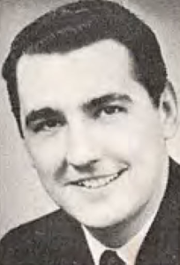 Dave Diles - WXYZ - WDEEBlack-and-white portrait of a smiling man in a suit.